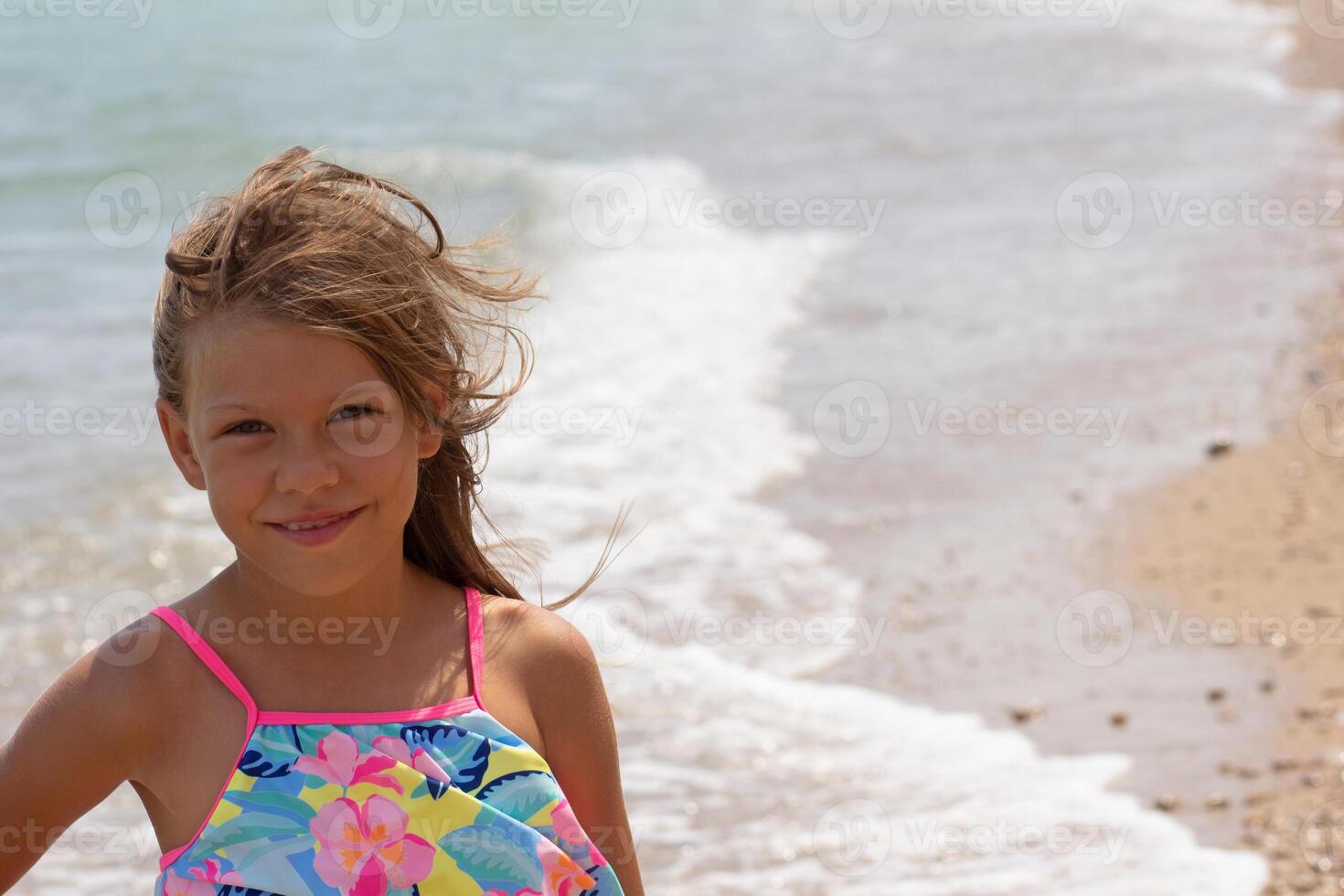 Portrait of beautiful girl looking at camera photo