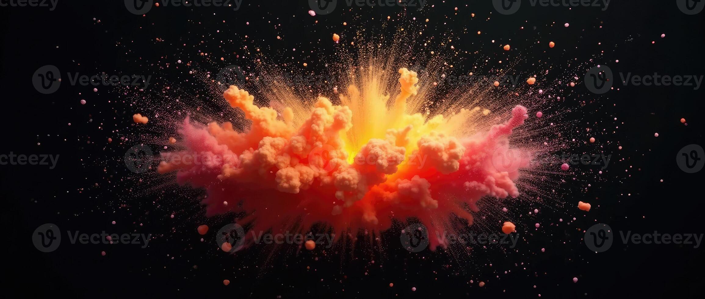 Colorful explosion of powder on black background photo