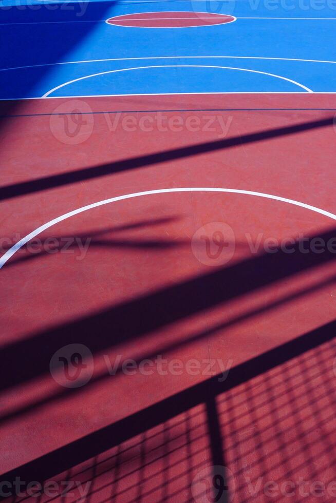 blue and red street basketball court on the street, sport photo