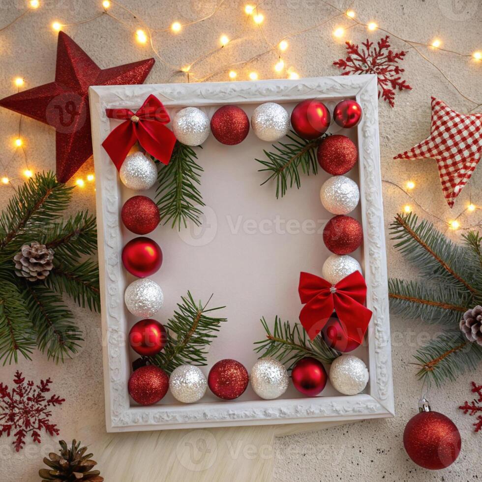 Christmas frame with red and silver balls and fir branches photo