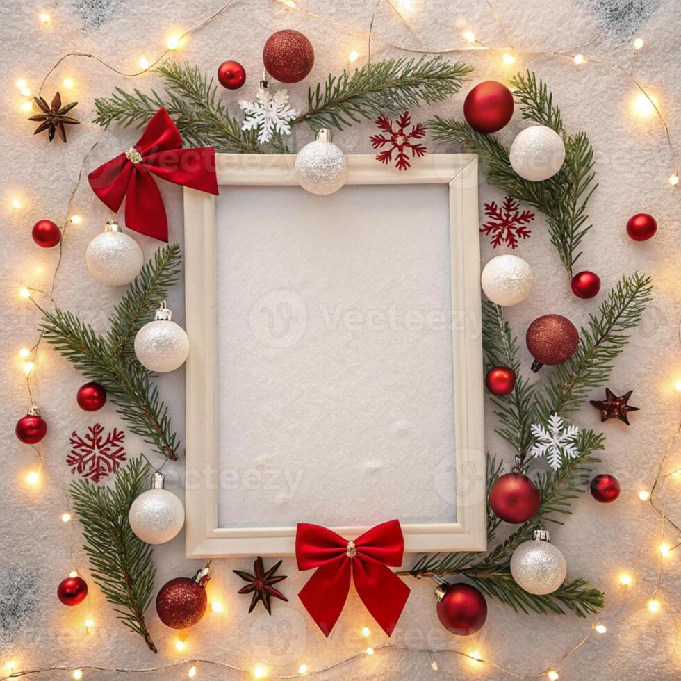 Christmas frame with red bow and christmas decorations on snow background photo