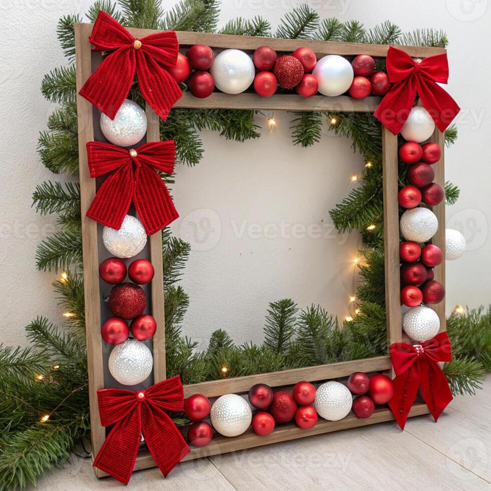 A frame with red and white christmas ornaments on it photo