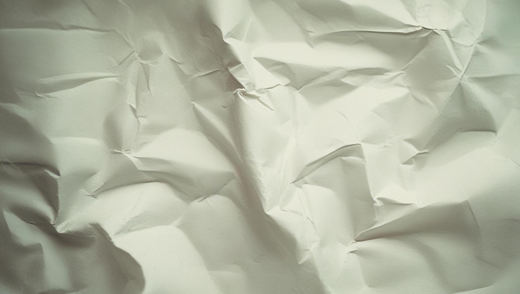 crumpled paper background with white crumpled texture photo
