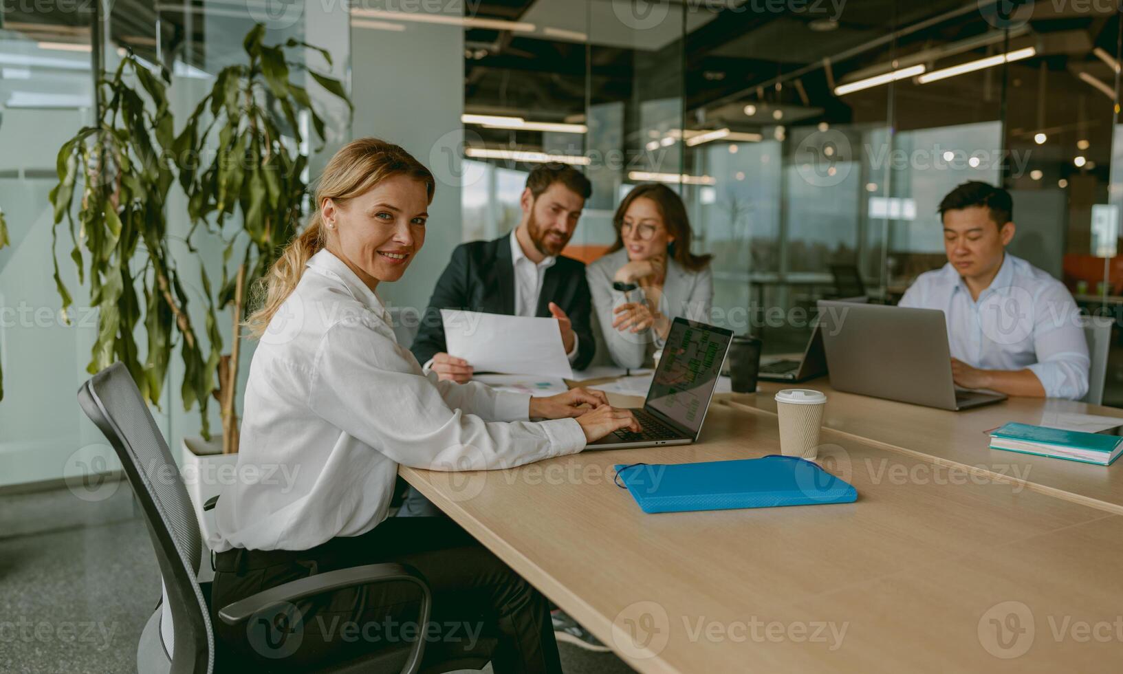 Diverse team collaboration is essential in a modern office environment for achieving success photo