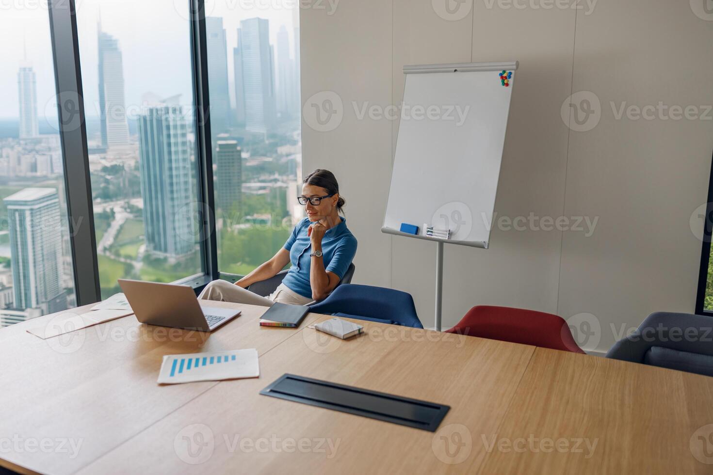 A Professional Thriving in a Modern Office Environment with Contemporary Elements and Tech photo