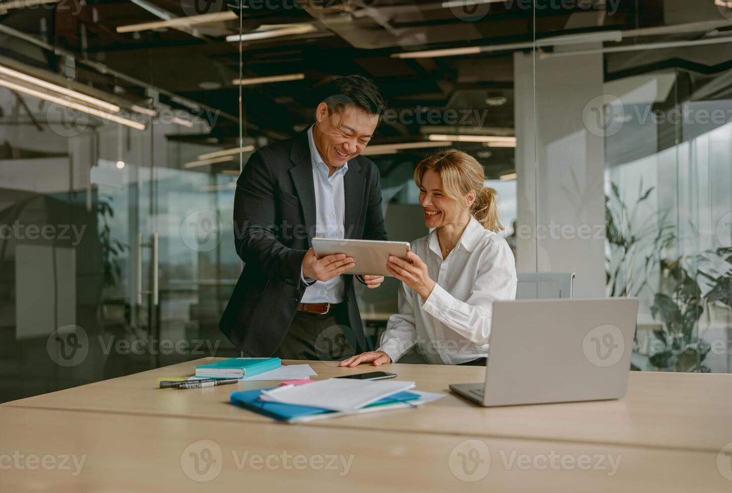 Exploring Collaboration in a Contemporary Office Environment Utilizing Tablets for Efficiency photo