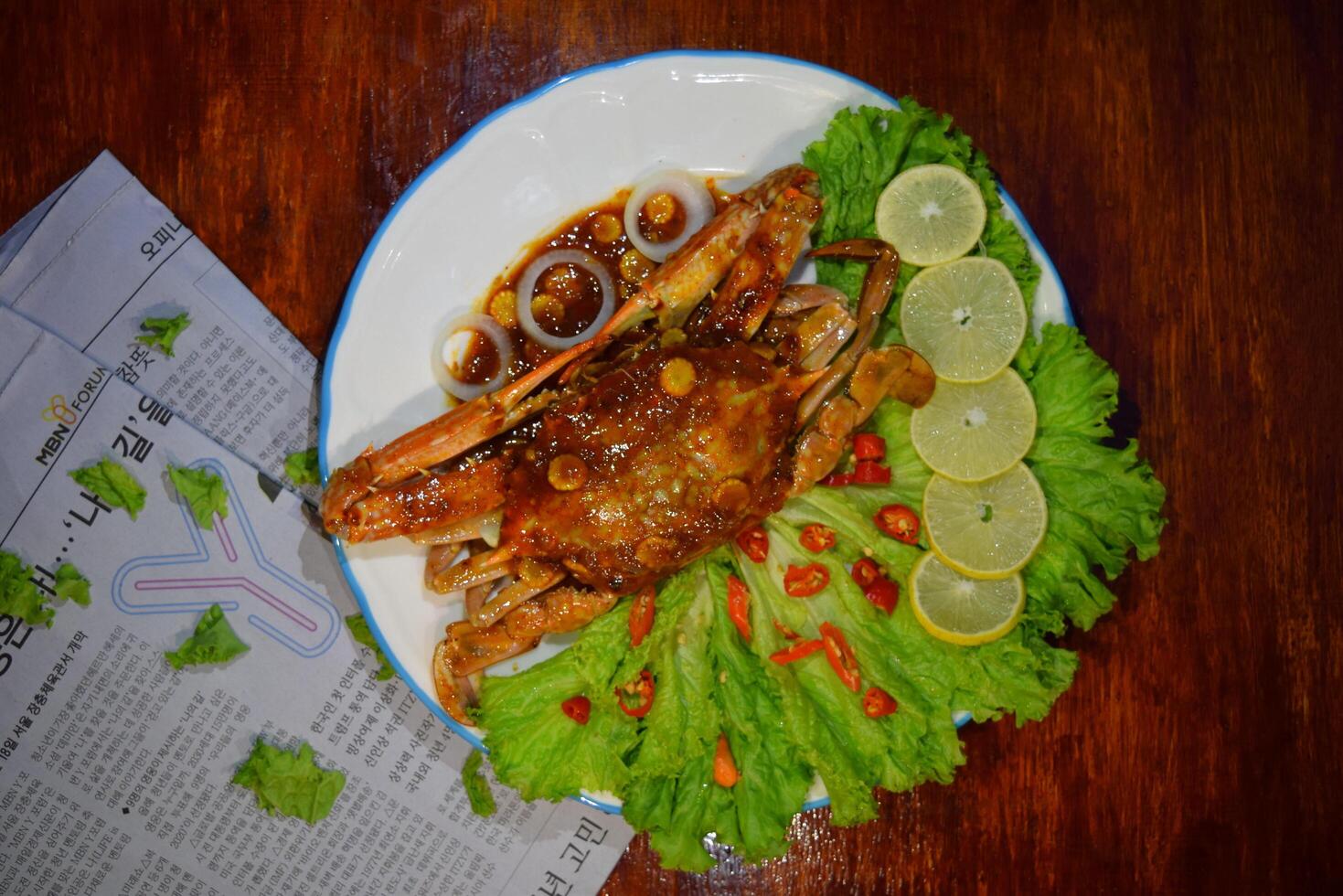 crab with sauce and lettuce on a plate nobleseed photo