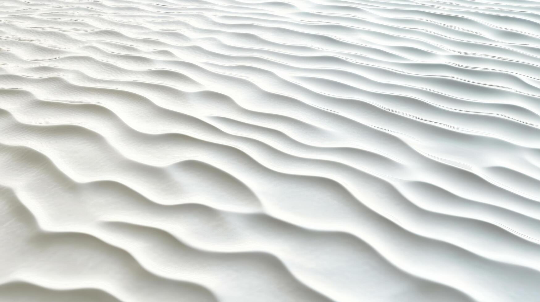 White sand dunes with waves in the background photo