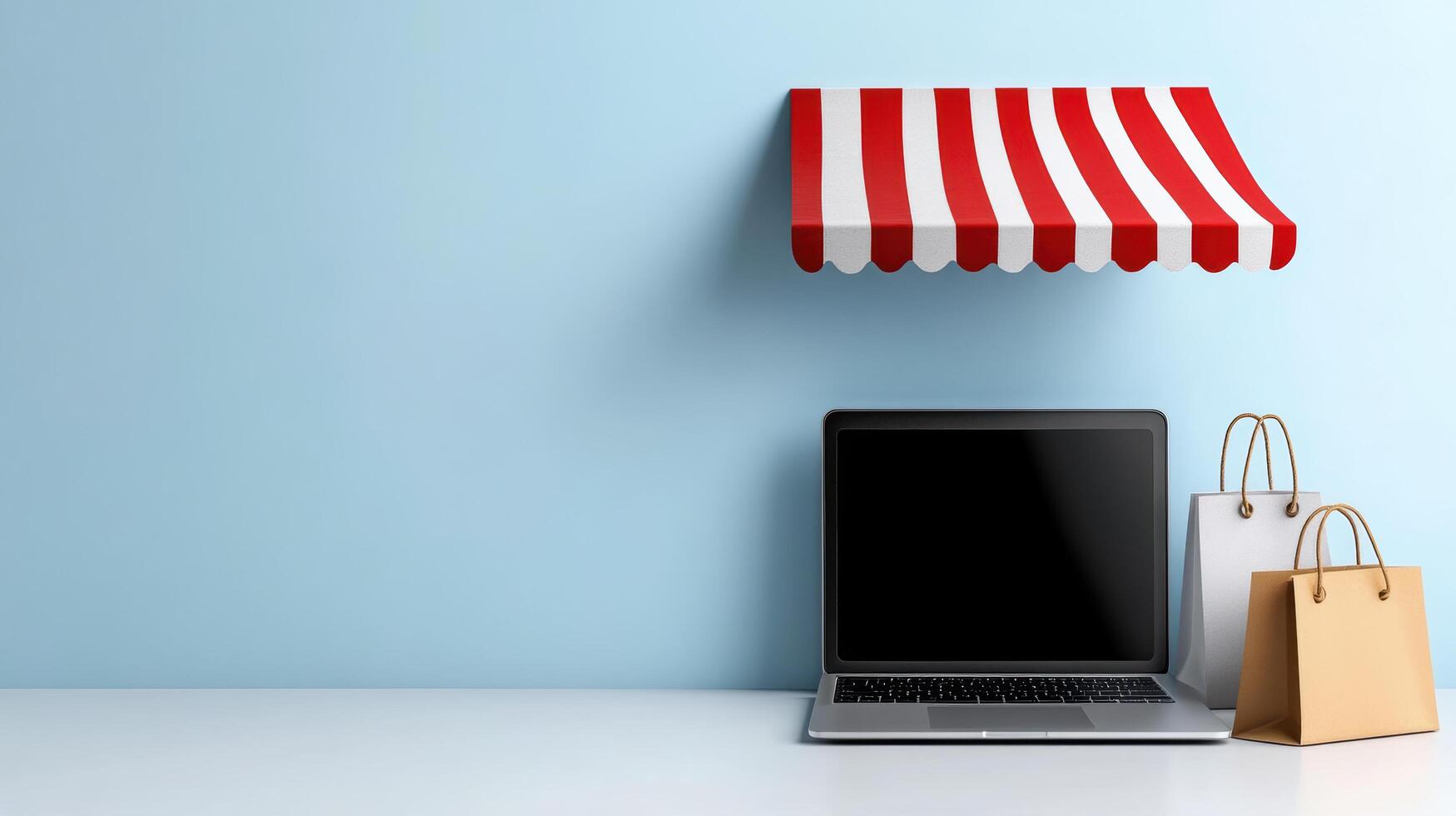 Laptop and shopping bags on a blue table with a red and white awning photo