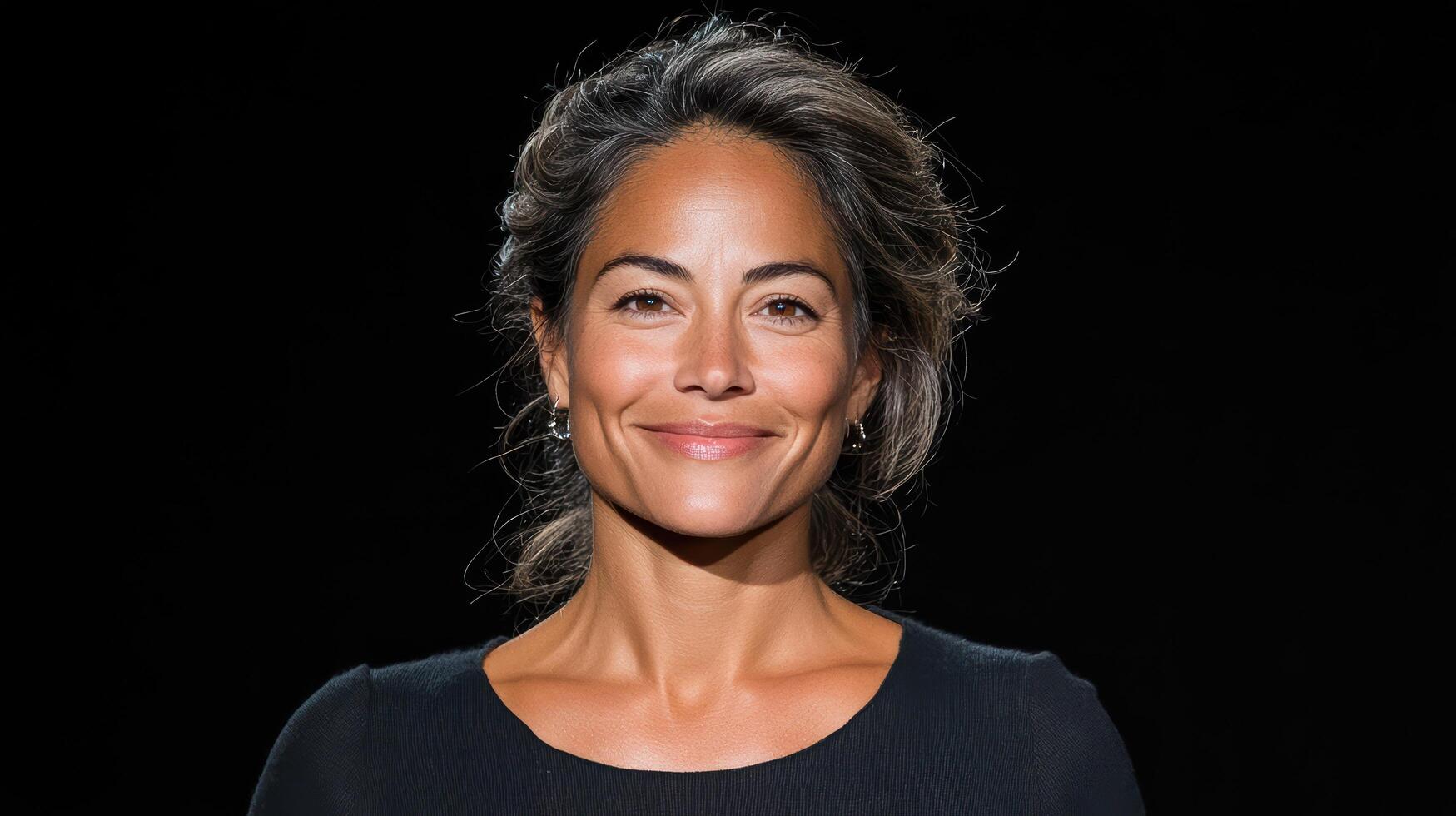 A woman with a black top smiling photo