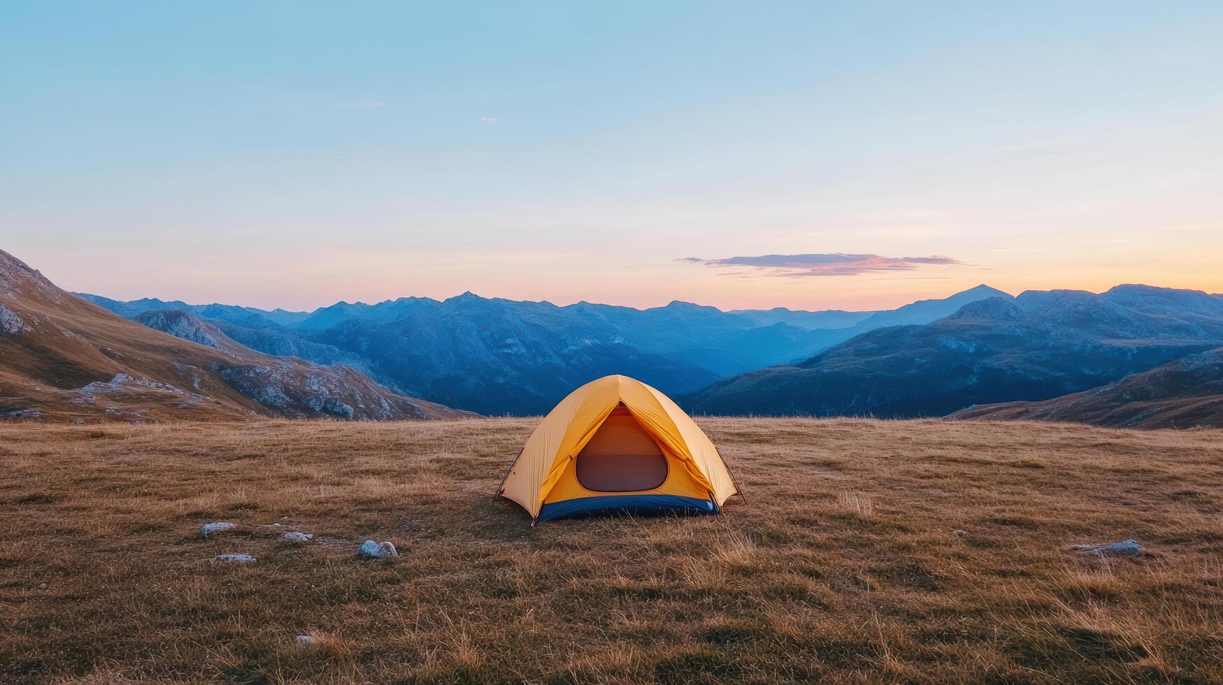 bright yellow tent stands alone vast alpine landscape, surrounded by majestic mountains twilight photo