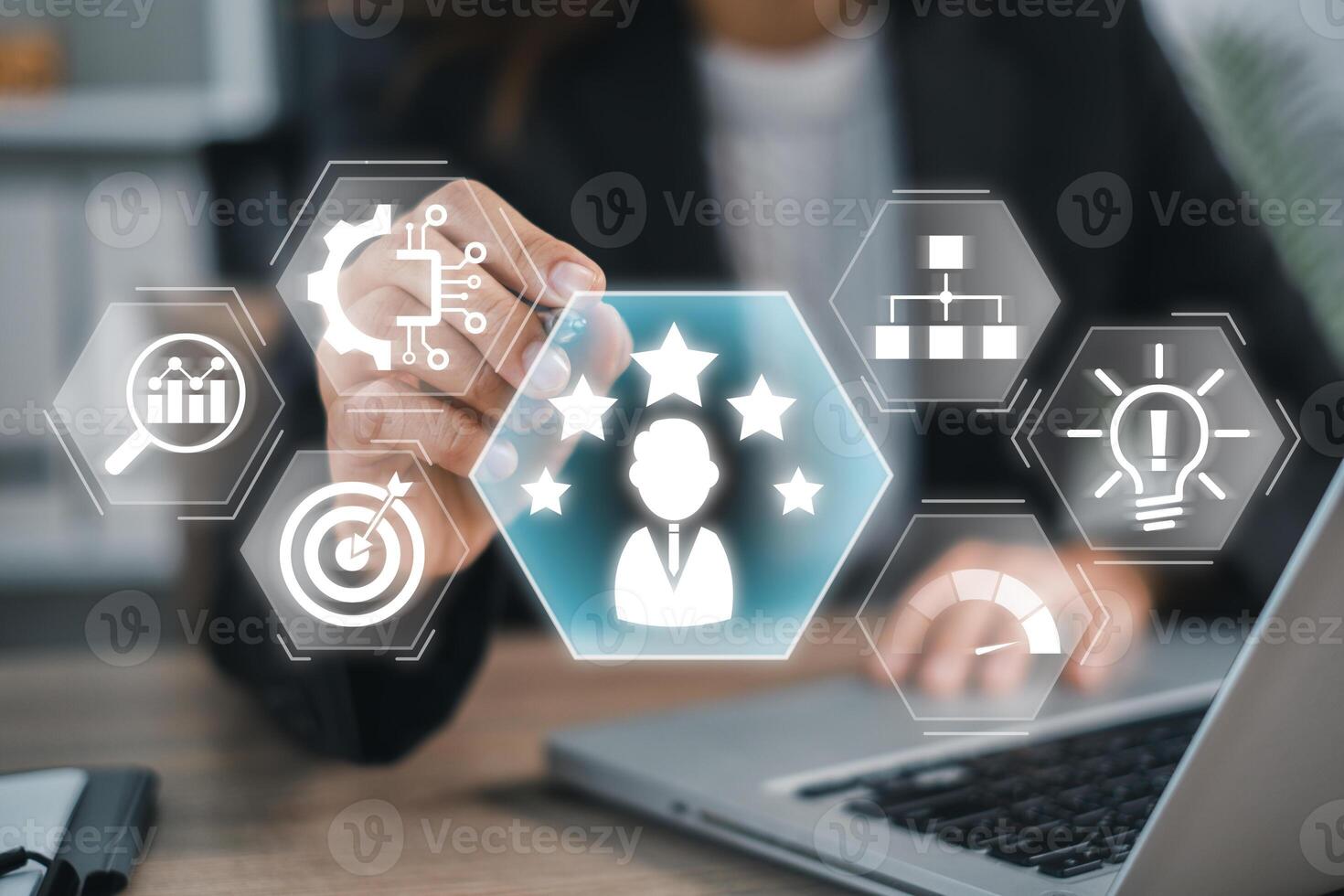 A business professional uses digital tools to improve customer experience, focusing on innovation and strategic growth. photo