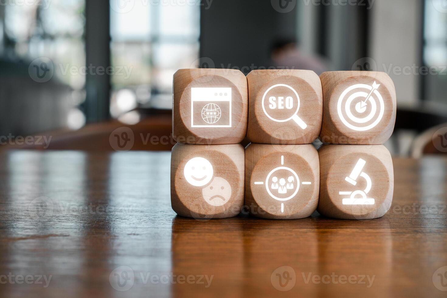 Creative representation of marketing using digital icons on wooden blocks, symbolizing modern advertising techniques. photo