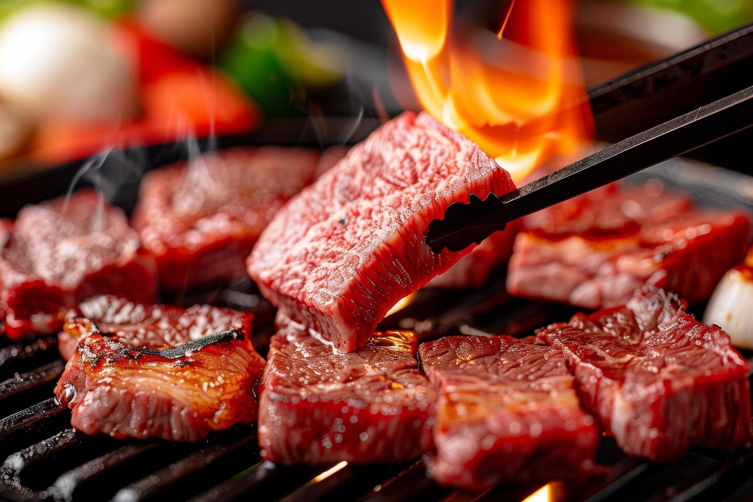 A close up of a grill with meat on it photo
