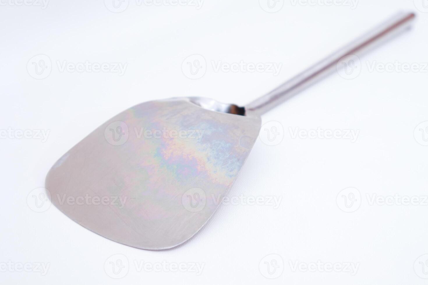 Sleek Stainless Steel Turner Tool for Culinary Precision and Kitchen Use photo