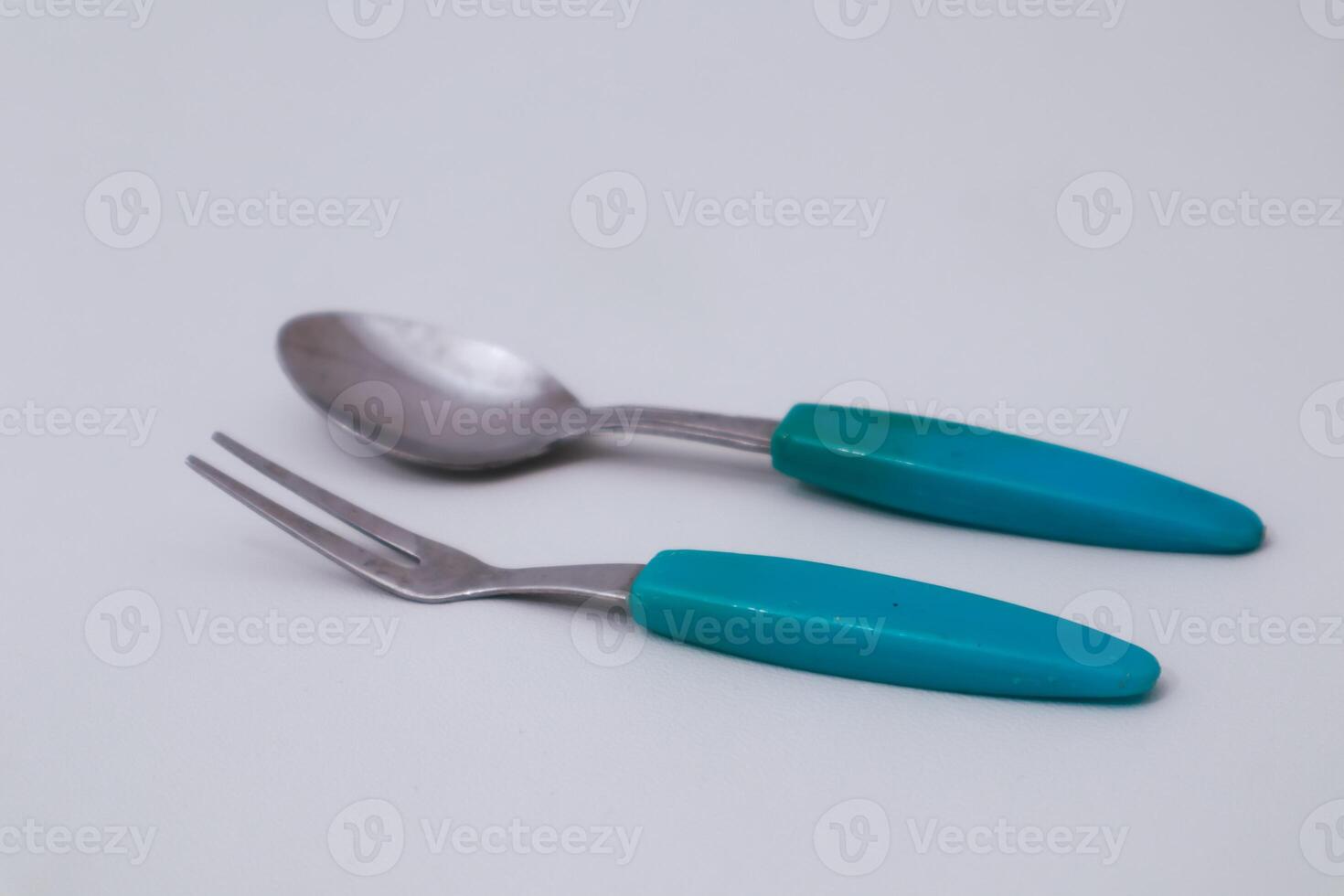 Vintage Silverware with Blue Handles a Culinary Time Capsule Still Life photo