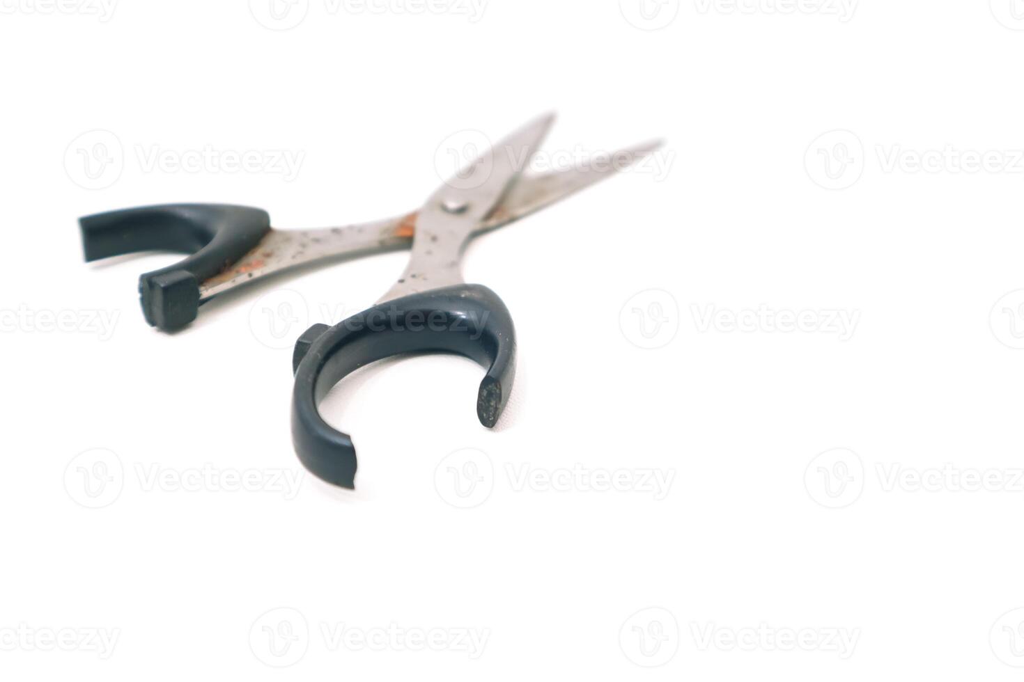 Isolated Scissors on White Background Showing Rust and Handle Damage photo