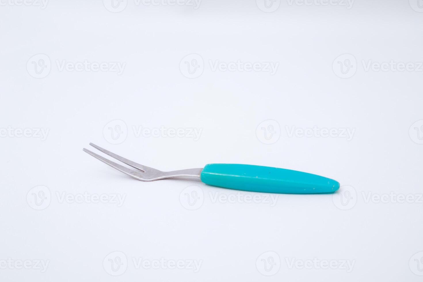 Elegant Two-Pronged Fork with Vibrant Handle for Culinary Creations photo
