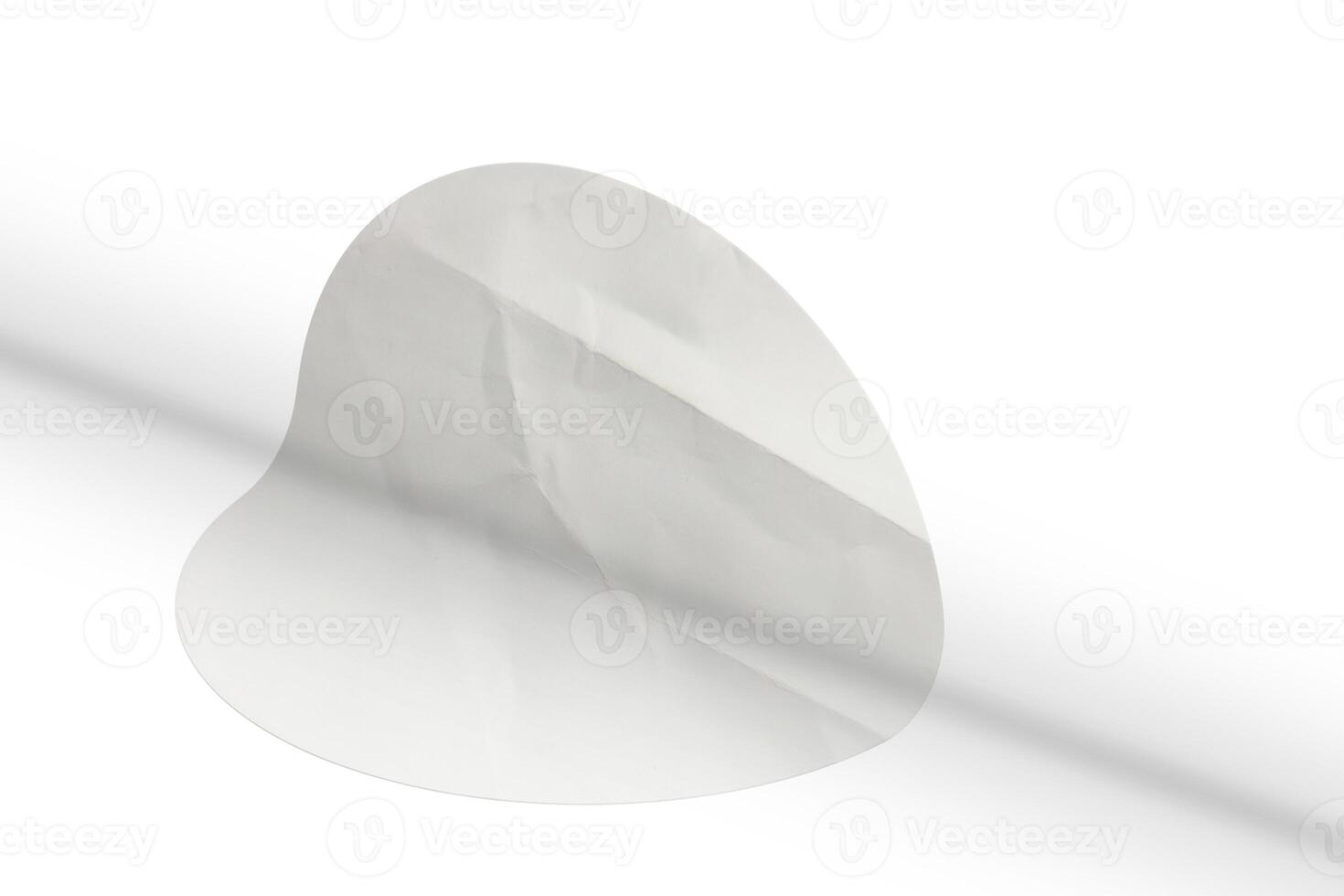A white paper with a curved edge photo
