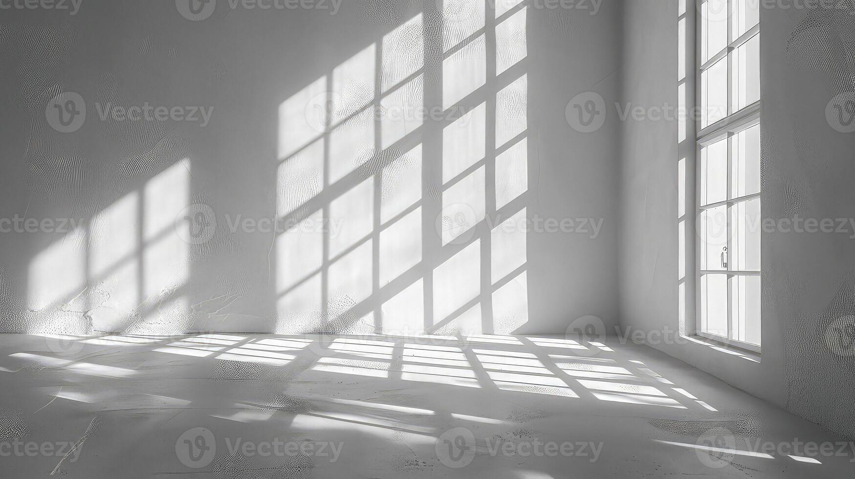 A white room with large windows and a floor photo
