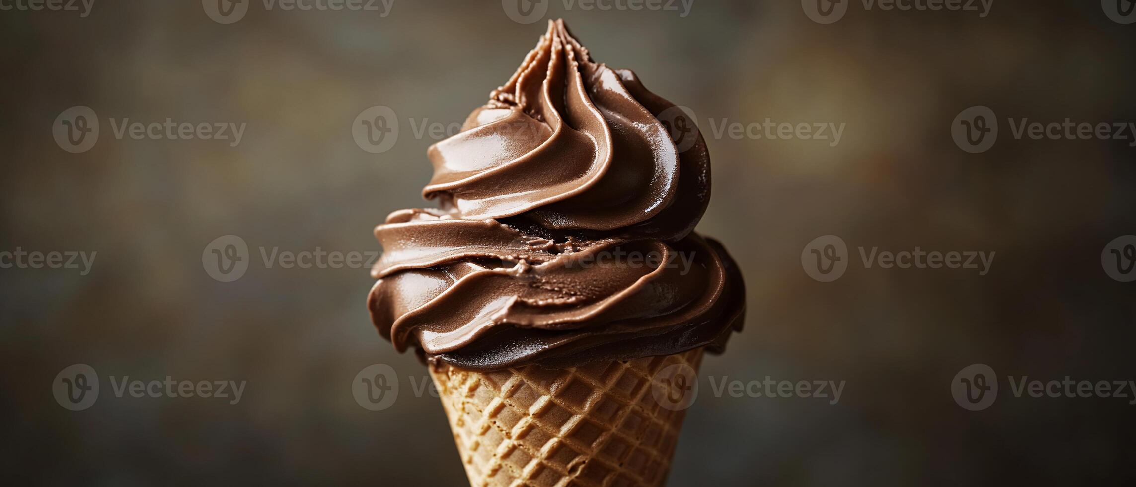 Chocolate ice cream cone on blurred background photo