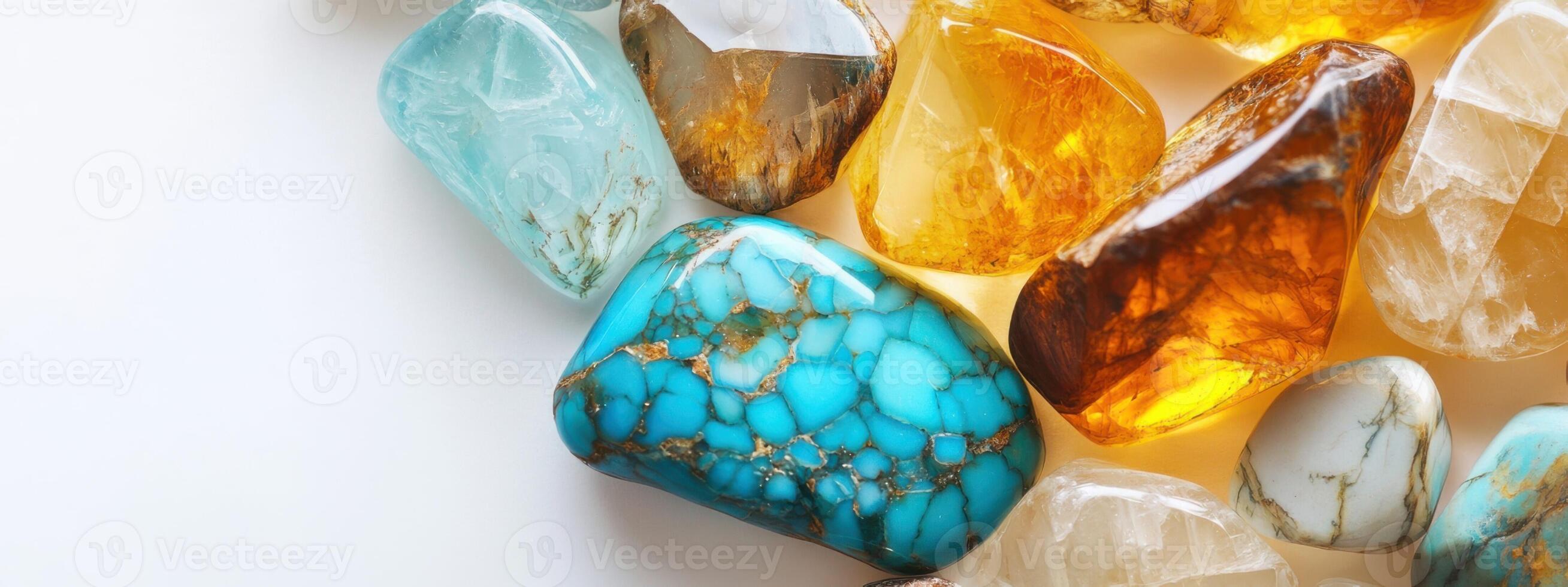 Colorful collection of polished gemstones displaying unique patterns and textures in bright light photo