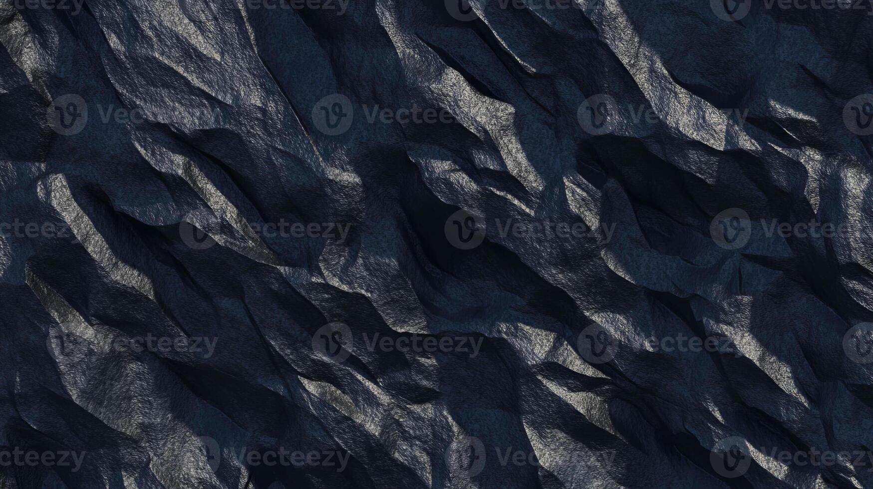 Natural black slate texture with matte uneven surface for background design photo