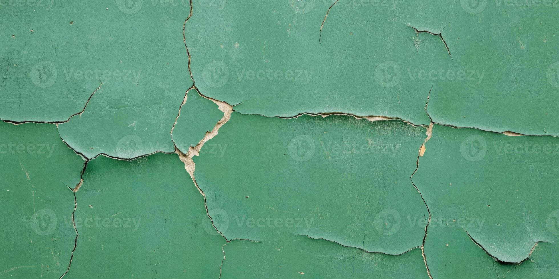 Texture of cracked forest green wall with subtle grunge elements and distinctive details photo