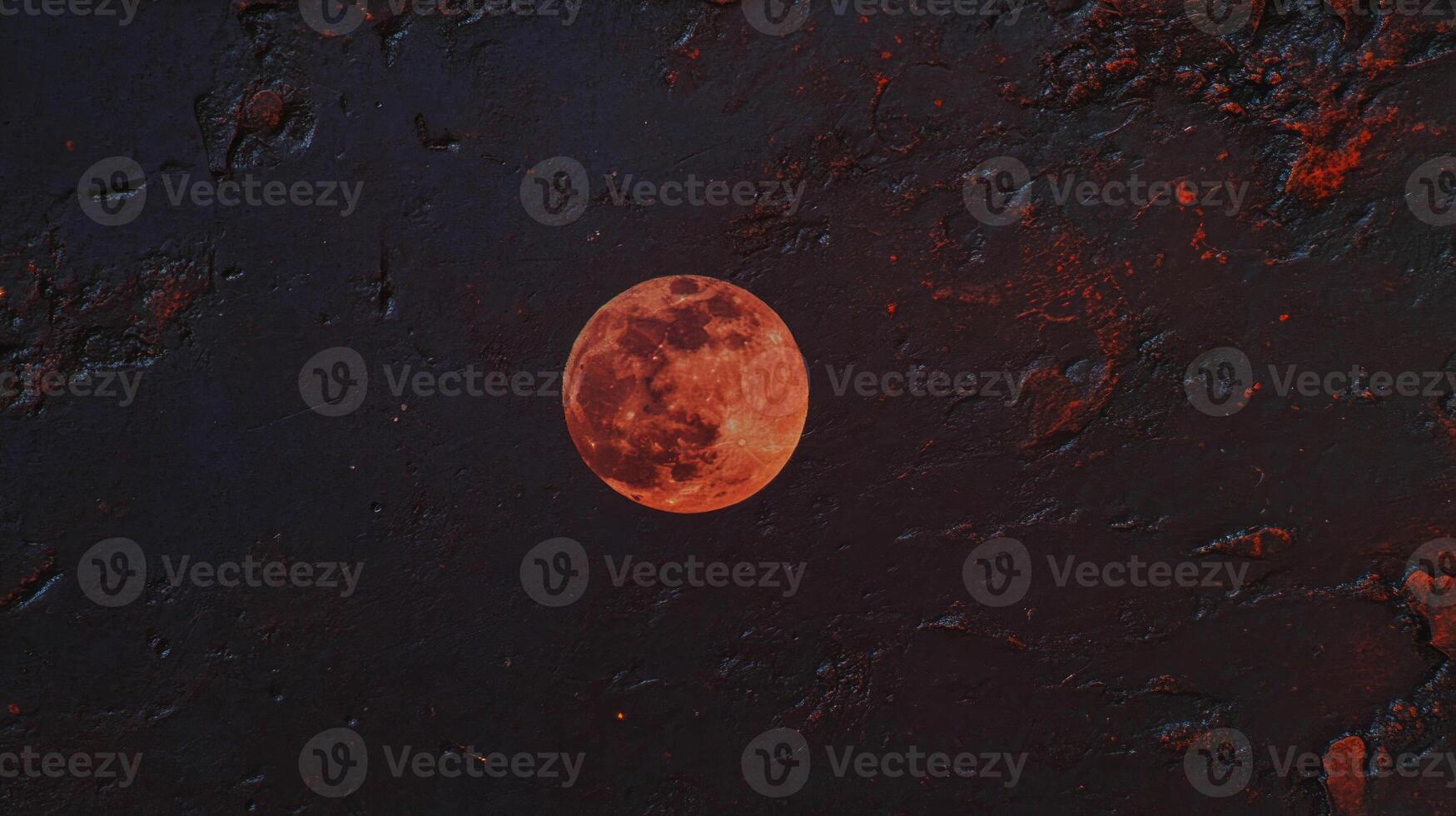 Mysterious red moon against rustic dark background photo