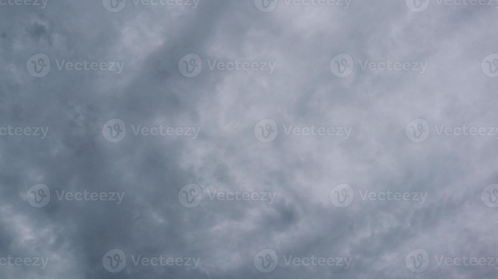 Deep gray clouds with abstract pattern during rainy season photo