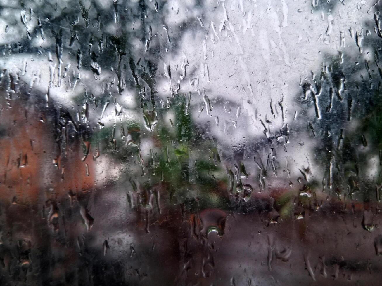 Abstract Rain Drop Pattern on Window Glass photo