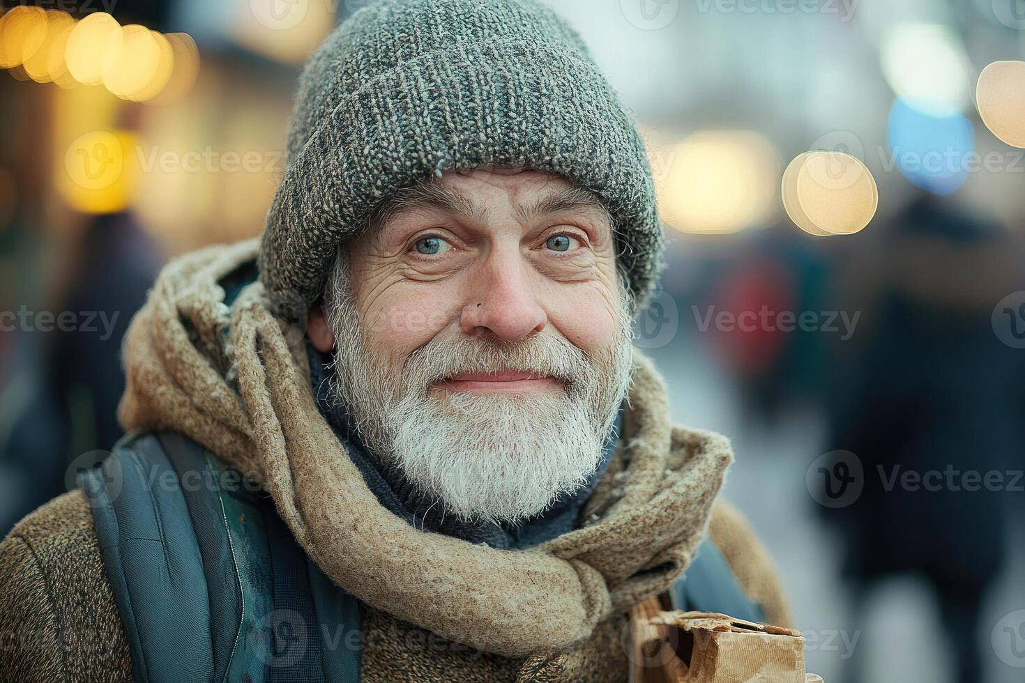 A man with a beard and hat is standing in the street photo