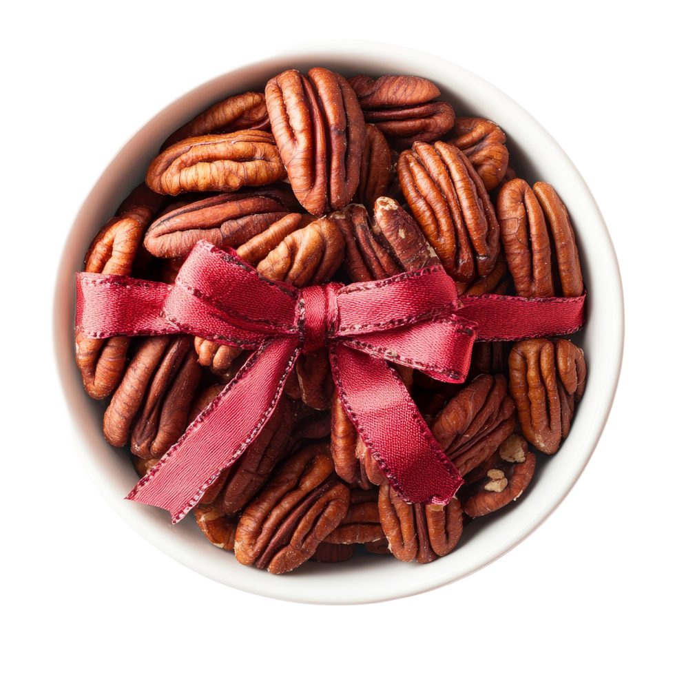 Fresh pecans in a bowl with a ribbon on a transparent background, perfect for gifting or baking occasions, Fresh pecans in a bow lon a transparent background png