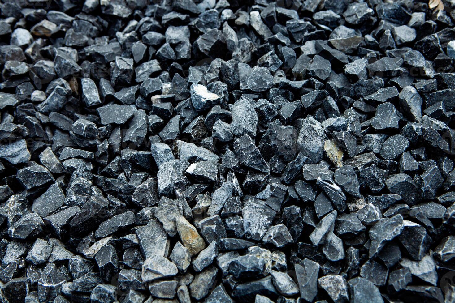 Dark Volcanic Rock Background with Rugged Details photo