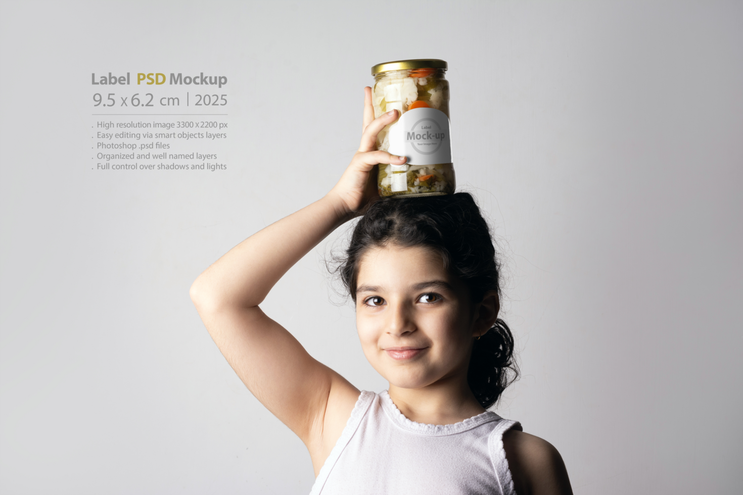 Little girl holding a pickled glass conserve on her head psd