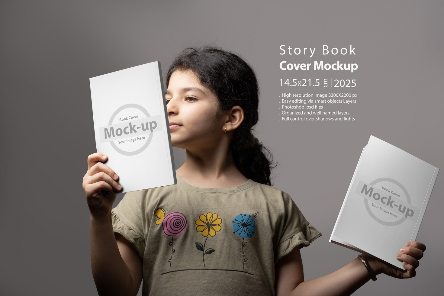 Little girl holding two books in hands with blank cover mock-up series psd