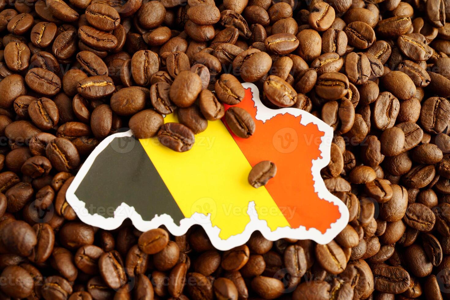 German flag on coffee beans, shopping online for export or import food product. photo