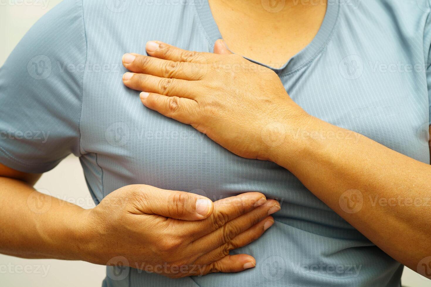 Asian woman self touching check lump or Breast cancer, Breast photo