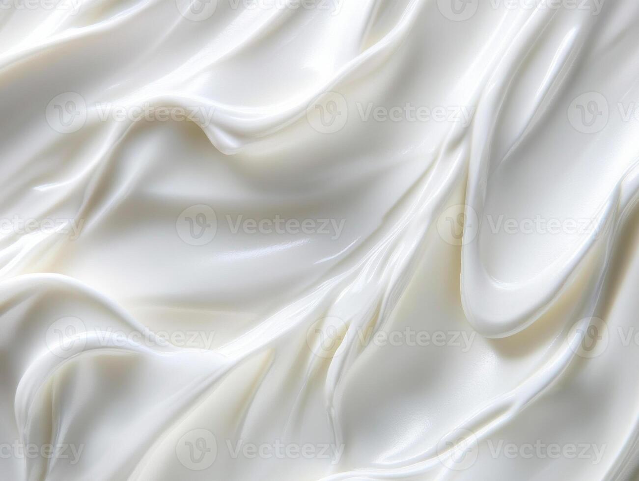 Smooth, creamy white texture with flowing, silky waves creates soothing and luxurious appearance photo