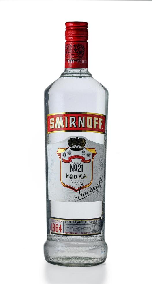 Gaziveren Cyprus -18.03.2025 Clear spirit in a stylish bottle vodka Smirnoff is ready for celebration moments in festive gatherings at night photo