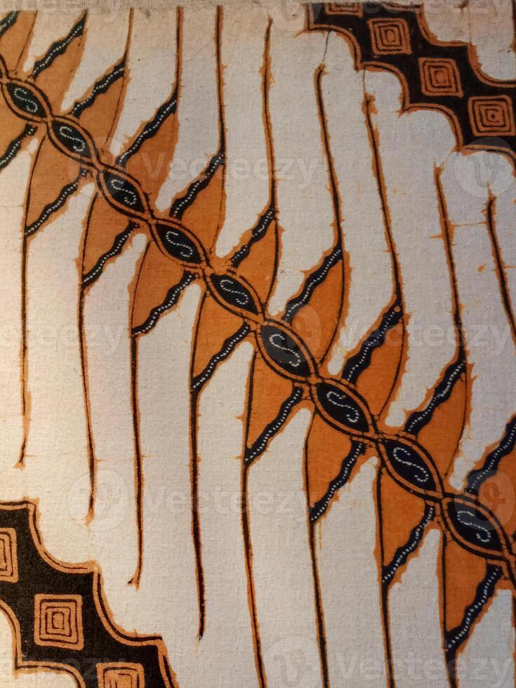 Batik pattern background. A close up of Javanese batik with a Parang Wenang pattern. Indonesian batik. photo