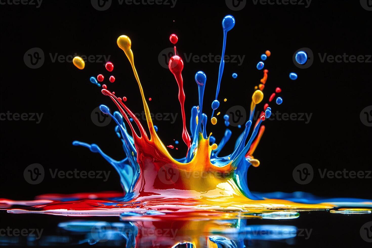 Vibrant Red Yellow Blue Paint Splashes in Midair Against Black Background Reflecting on Surface photo
