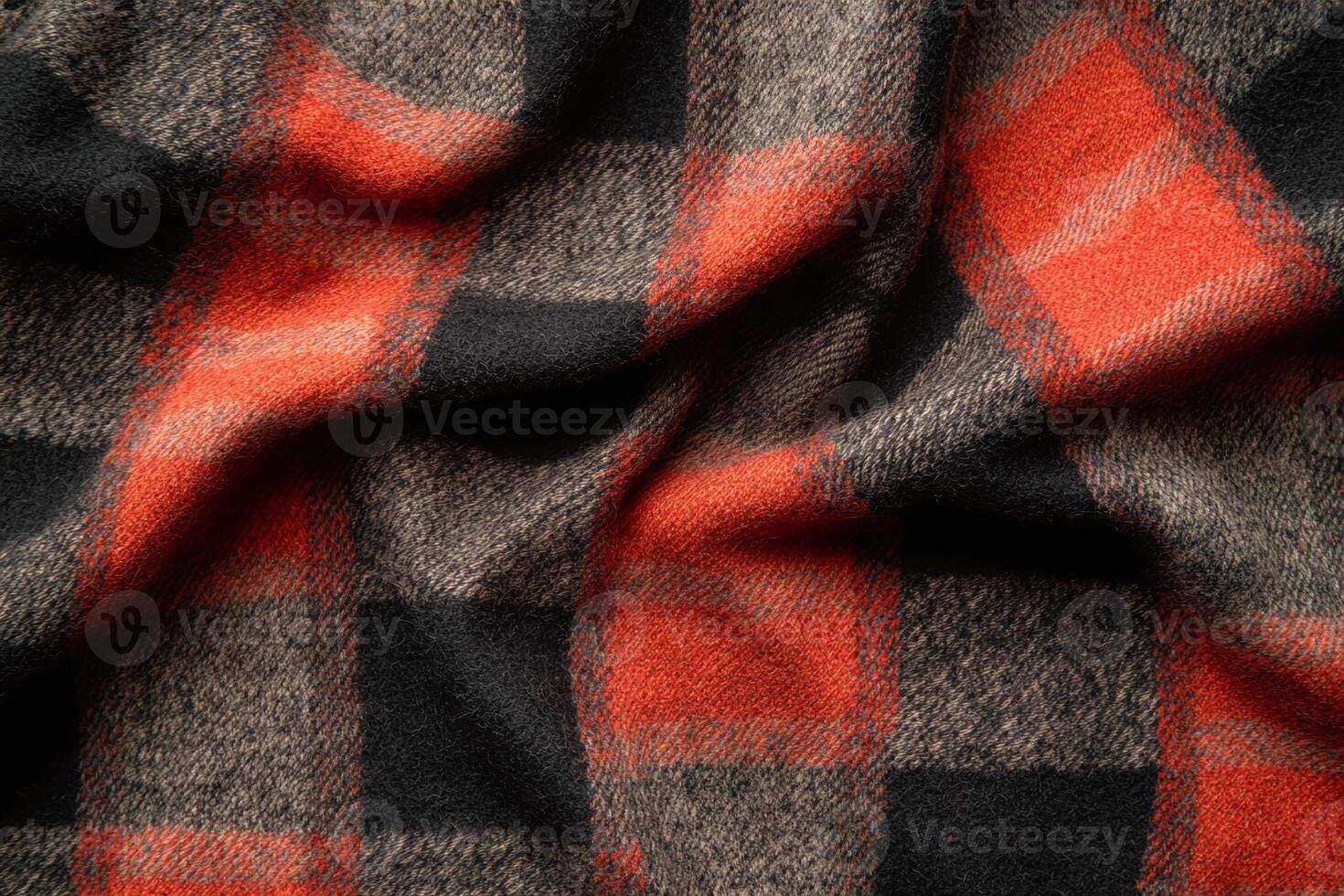 Closeup of Red and Black Plaid Wool Fabric with Subtle Beige Texture for Winter Clothing and Home Decor photo