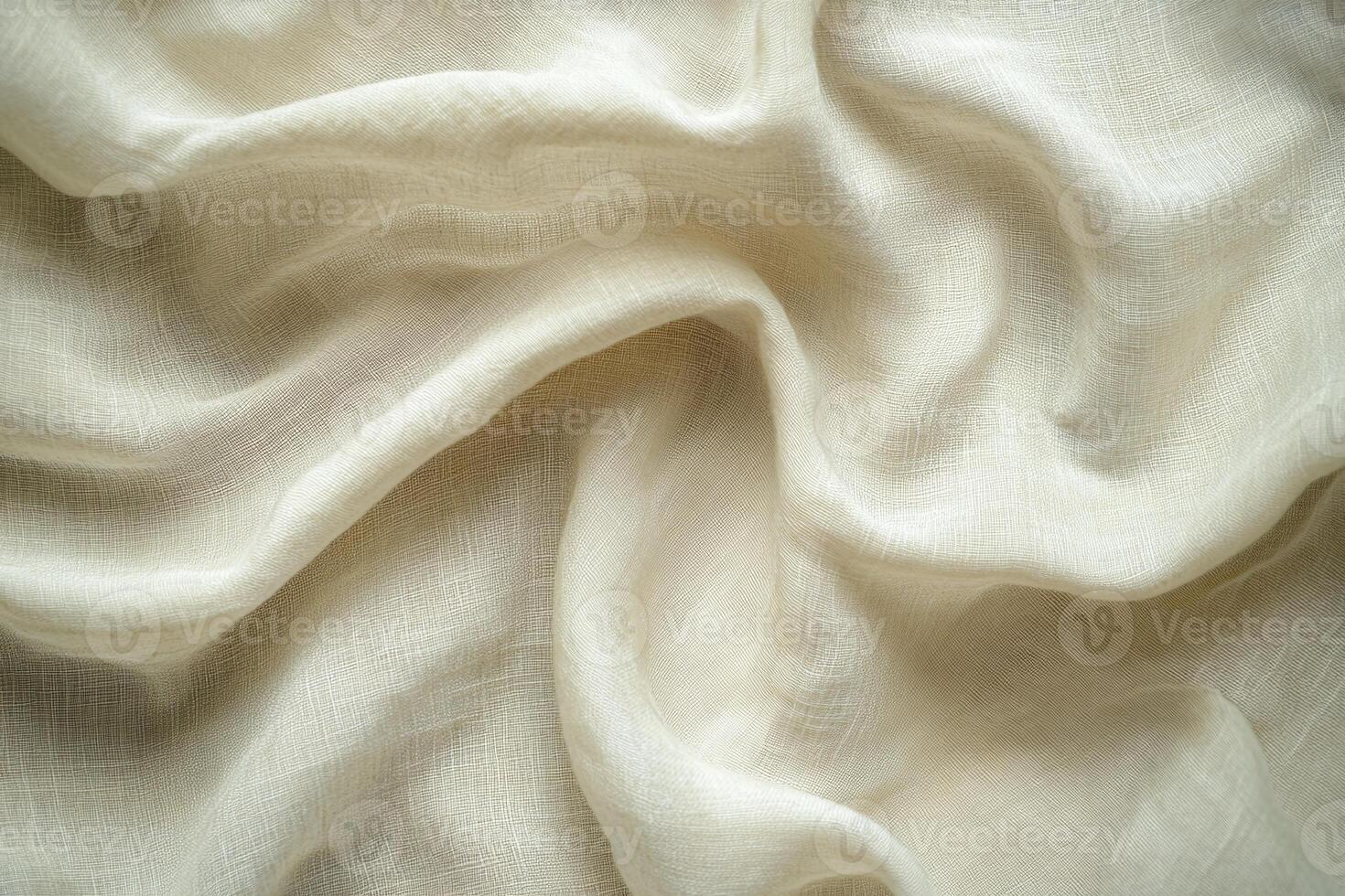 Soft Beige Fabric With Flowing Folds and Textured Weave for Background or Design Element photo