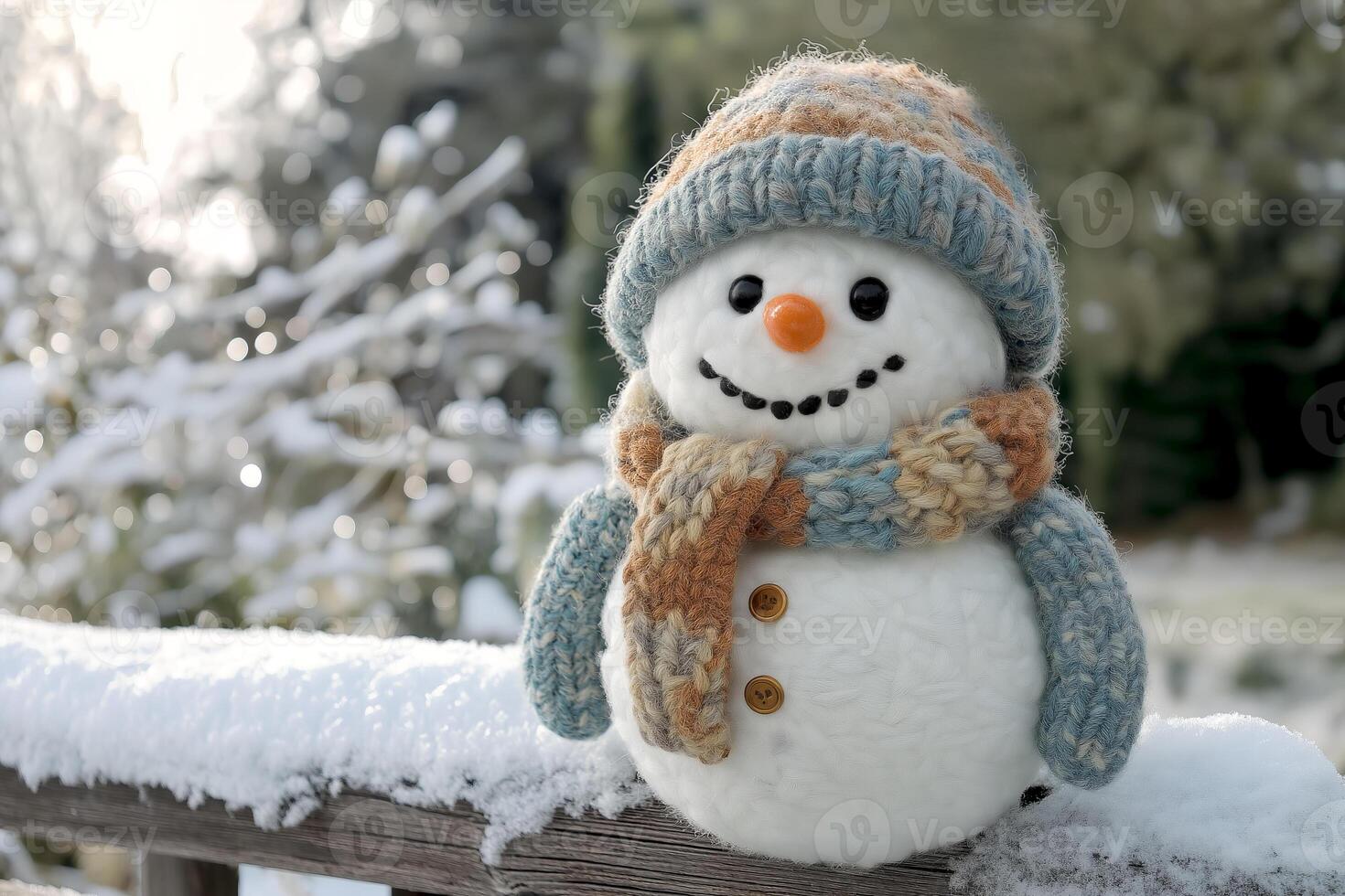 Cheerful snowman stands on a wooden railing covered in fresh snow during a winter morning in a serene outdoor setting. Cute snowman wearing a colorful knitted hat and scarf smiles brightly photo