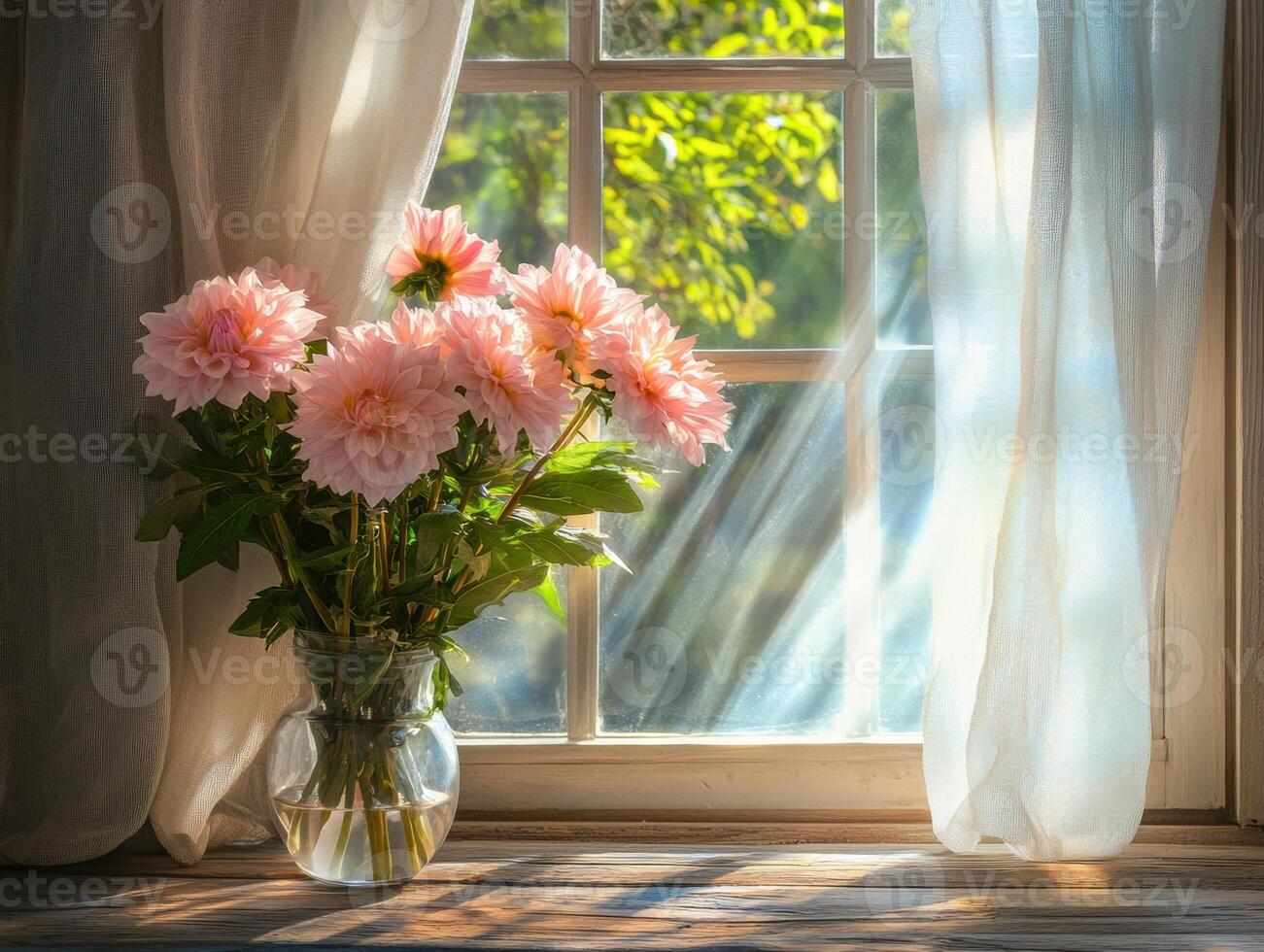 Beautiful flowers in a vase by a sunlit window photo
