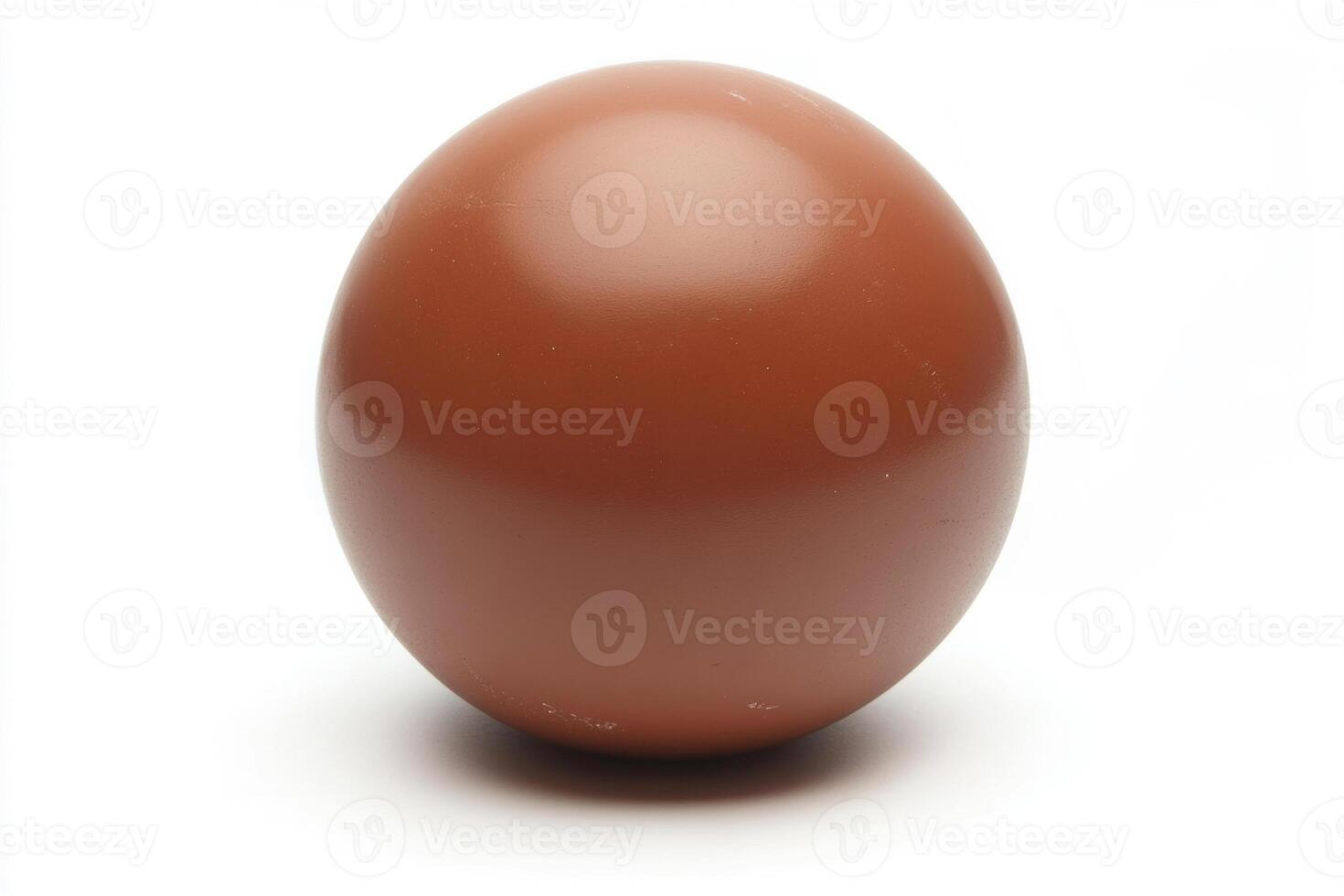 Brown sphere display on white background showcases smooth texture photo