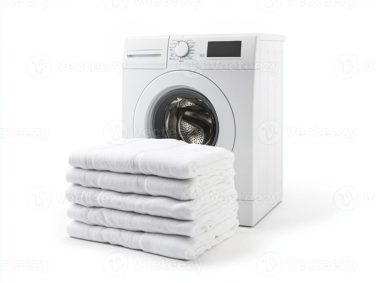 Washing machine with neatly stacked white towels at home photo