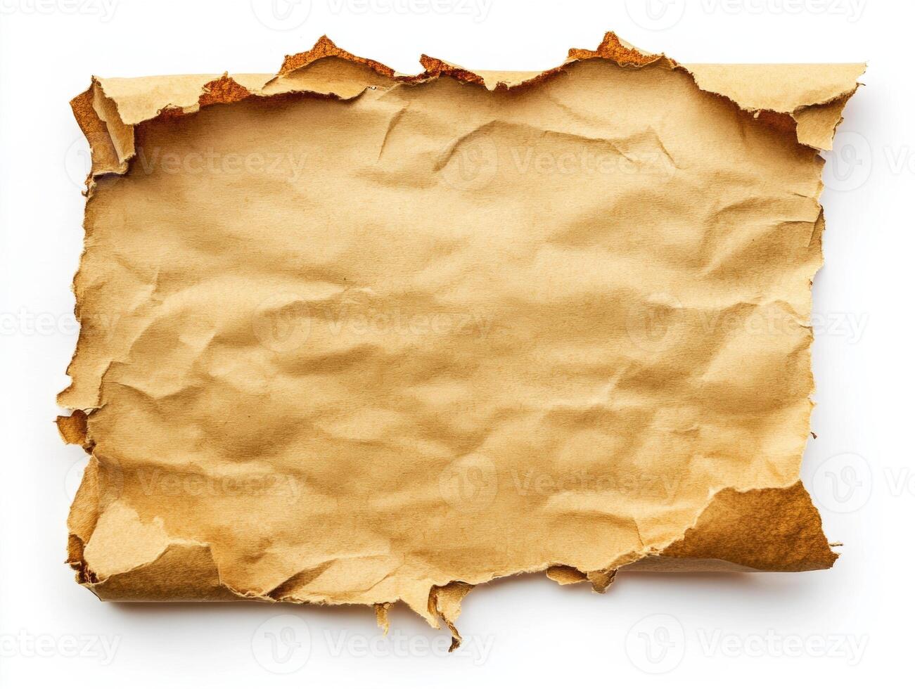 Old textured paper with torn edges on a plain background photo