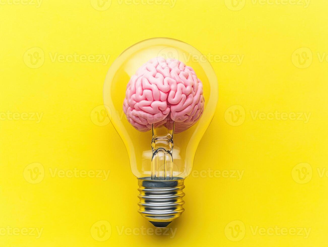 Conceptual illustration of innovation with a brain in a light bulb photo
